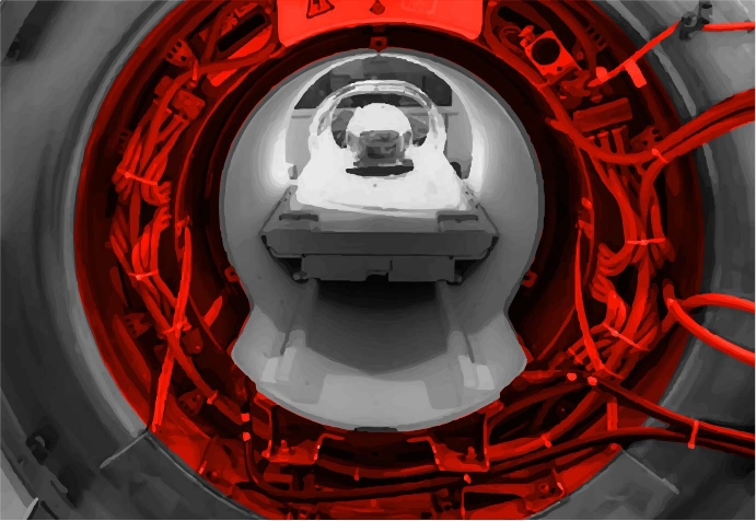 black and white image of an MRI machine with components highlighted in red